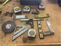 Lot of assorted tape measures and sticks