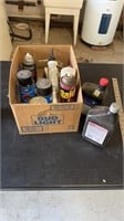 Box of motor oil spray paint and more