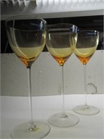 Three Amber Wine Glasses