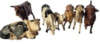 SEVEN VINTAGE METAL AND LEAD COWS MADE IN ENGLAND