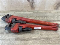 1 MEDIUM AND 1 SMALL PIPE WRENCHES (ORANGISH RED)