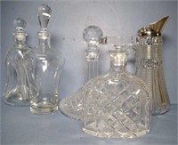 Four glass and crystal decanters