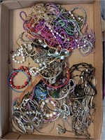 Box of costume jewelry.