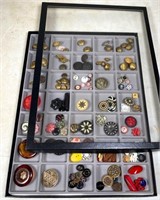 assorted buttons in display case