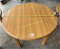 42" round oak table.