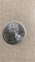 Walking Liberty $1 
Fine silver