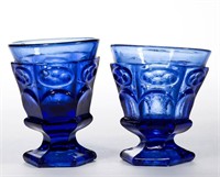 PRESSED PANELLED OVAL AND FLUTE FOOTED TUMBLERS,