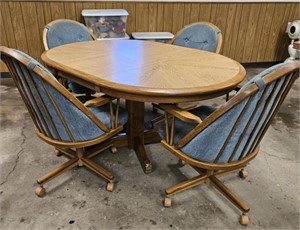 Oak Dining table with 4 rolling chairs