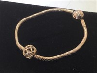 Pandora rose gold bracelet w/ figure 8 charm