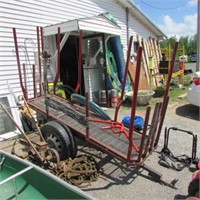S/A WOOD HAULING TRAILER W/ STAKES