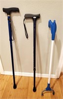 Two Adjustable Canes and a Grabber