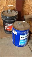 Tractor hydraulic fluid and empty kerosene bucket