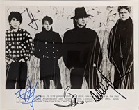 U2 signed photo