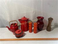 two red enamel teapots and more