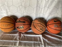 1LOT (4) ASSORTED BASKETBALLS ** USED ( SOME MAY