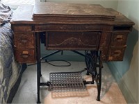 Antique Singer Sewing Machine in cabinet