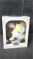 DOLL IN BOX