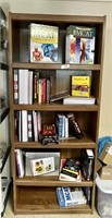 Pressed wood bookcase and contents