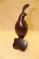 Carved wooden quail