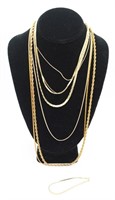 7 MISC LENGTH GOLD TONED NECKLACES AND A BRACELET