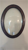 Vintage convex glass 22" oval wood picture frame
