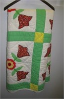 Vintage handmade and quilted quilt with applique