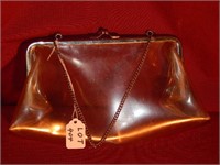 Soft lucite purse with chain handle
