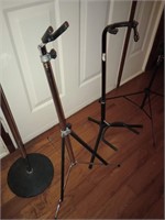4 musical stands. 2 guitar, 1 sheet music and 1