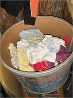 Barrel of infant clothes