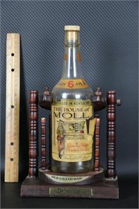 The House of Moll Liquor Bottle with Wood Rack