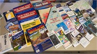 Box of road atlases and road maps