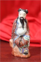 An Antique Chinese Porcelain Figurine