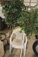 2 fake trees and 2 plastic chairs