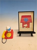 smurf phone and snoopy picture