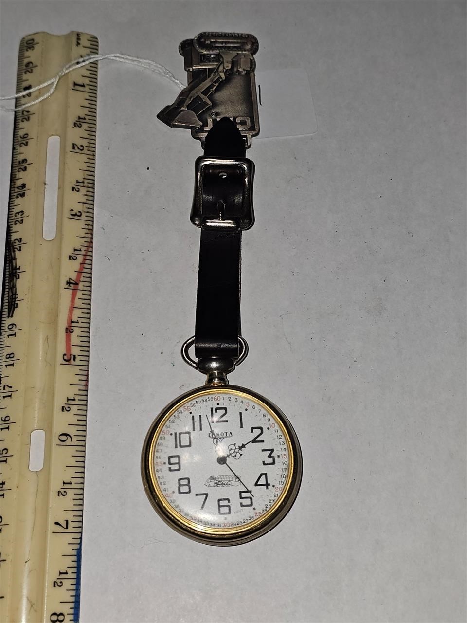 Pocket watch with CAT fob, watch has damage