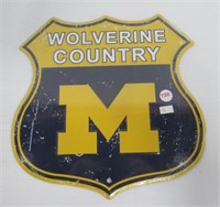 Tin Wolverine sign. Measures 11" H x 11" W.