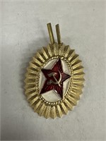 SOVIET MILITARY UNDER THE RED ARMY STAR CAP BADGE