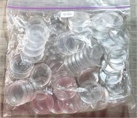 73-25 Cent Plastic Capsules in a bag