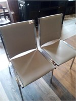 2 gray metal office chairs