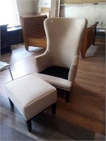 Cream colored high back chair with