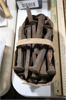 BASKET OF RAILROAD SPIKES