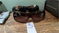 Two pairs of dolce and Gabbana sunglasses