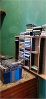 Collection of cassettes and CDs shelf not