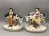 Staffordshire boy and girl with cow statues