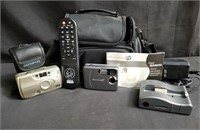 Box of vintage cameras and camcorder