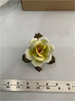 Yellow white porcelain rose on brass stem