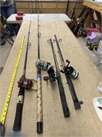 four ugly stick fishing rods with reels
