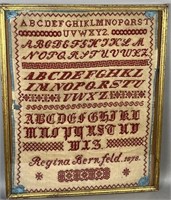 Framed stitchwork sampler of Regina Bernfeld ca.