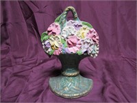 Antique cast iron doorstop. Flower basket.