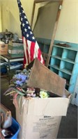 American flag and pole, flowers, copper planter